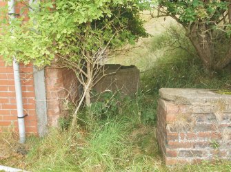 Explosives Magazine R53: a concrete rainwater butt at the W gable-end