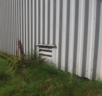 Explosives Magazine R46: view from the NNE showing a ground vent in the cladding