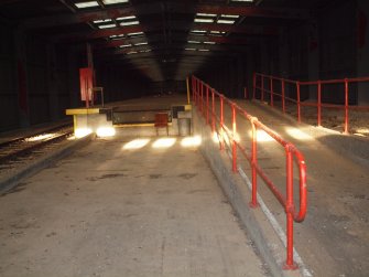 View from the WSW of the platform and a ramp within the main transit building (Y17)