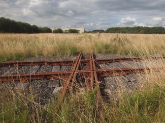 The Narrow Gauge and a Standard Gauge railway crossing (NY 25320 64813) immediately WNW of the transit area