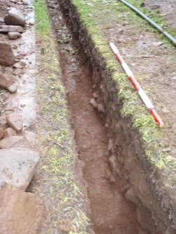 Excavation photograph, Oblique shot of possible path and wall, post-excavation taken from NE, Carzield Roman Fort, Kirkton, Dumfries