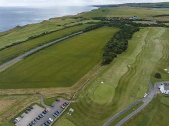 Oblique aerial view from north showing Recreation (Golf Course) and proposed area for development in Modern (Gunsgreenhill) Areas of Townscape Character, Eyemouth