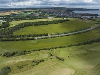 Oblique aerial view from east showing Recreation (Golf Course) and area for proposed development in Modern (Gunsgreenhill) Areas of Townscape Character, Eyemouth