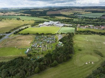 Oblique aerial view from east-north-east showing Recreation (Golf Course) and Modern (Gunsgreenhill) Areas of Townscape Character, Eyemouth