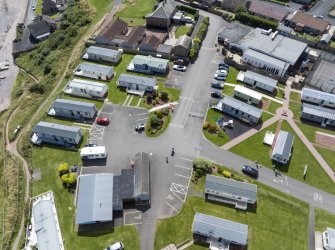 Oblique aerial view from north showing Recreation (Holiday Park) and Mid- to Late C20 (Barefoots) Areas of Townscape Character, Eyemouth