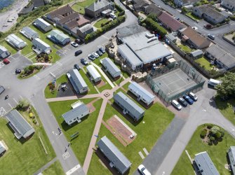 Oblique aerial view from north showing Recreation (Holiday Park) and Mid- to Late C20 (Barefoots) Areas of Townscape Character, Eyemouth