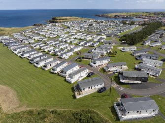 Oblique aerial view from north-north-west showing Recreation (Holiday Park) Area of Townscape Character, Eyemouth