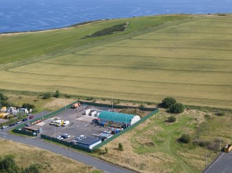 Oblique aerial view from north-west showing Industrial (Gunsgreenhill Industrial Estate) Area of Townscape Character, Eyemouth