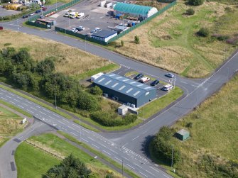 Oblique aerial view from north-west showing Industrial (Gunsgreenhill Industrial Estate) Area of Townscape Character, Eyemouth