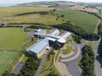 Oblique aerial view from north showing Modern (Gunsgreenhill) and Industrial (Gunsgreenhill Industrial Estate) Areas of Townscape Character, Eyemouth