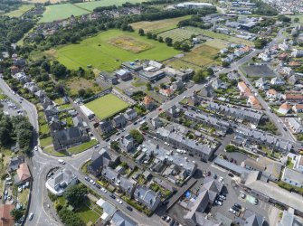 Oblique aerial view from north-east showing Inter-War (Hurkur Crescent and Schools) and Victorian Expansion Areas of Townscape Character, Eyemouth