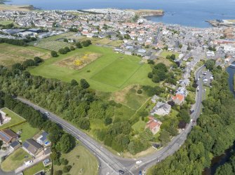 Oblique aerial view from south-east showing Victorian Expansion, Inter-War (Hurkur Crescent and Schools) and Mid- to Late C20 (Gillsland) Areas of Townscape Character, Eyemouth