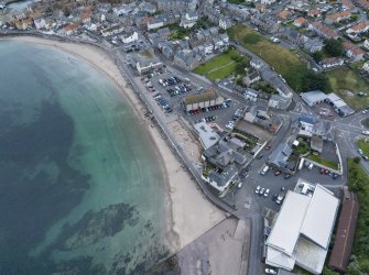 Oblique aerial view from north showing Historic Burgh and Harbour, Victorian Expansion and Inter-War (Hurkur Crescent and Schools) Areas of Townscape Character, Eyemouth