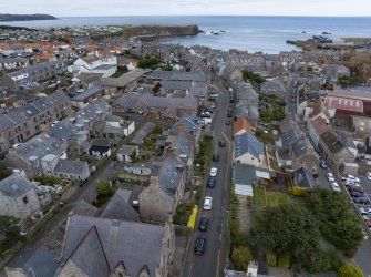 Oblique aerial view from south showing Historic Burgh and Harbour, Victorian Expansion and Inter-War (Hurkur Crescent and Schools) Areas of Townscape Character, Eyemouth