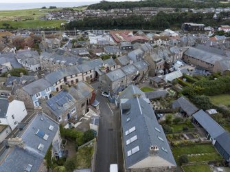 Oblique aerial view from north-west showing Historic Burgh and Harbour and Victorian Expansion Areas of Townscape Character, Eyemouth