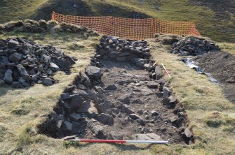 Excavation photograph, Mid-ex of trench 1, taken from NW, Tinnis Castle, Drumelzier