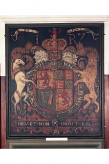 Interior - council chamber, detail of painted wooden 1686 heraldic plaque, Royal Arms of James VII.