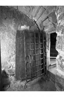 Interior -  third floor, eastern barrel vaulted cell, doorway, view from east