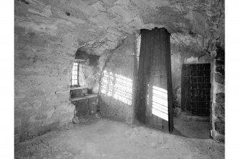 Interior -  third floor, eastern barrel vaulted cell, view from east