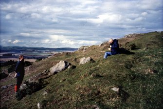 Strat Halliday and Sam Scott (both RCAHMS) at stone-lined W entrance of Barra Hill fort.