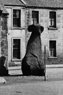 Cropped photograph showing standing stone.