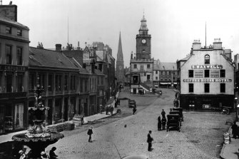 Photographic copy of historic photograph showing general view from south of Dumfries High Street including Midsteeple.