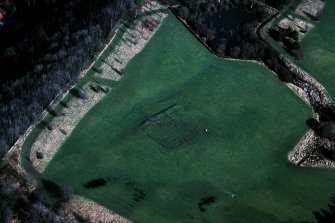 Oblique aerial view of Kinneil fort and the Antonine Wall (c. 986 807), taken from the S.