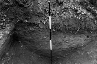 Excavation photograph of unidentified feature, described on mount as "Ditch of marching camp"