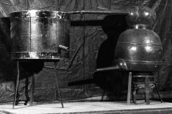 Lagavulin Distillery.
Detail of illicit-still apparatus: copper pot-still, head and worm (within worm-tub)