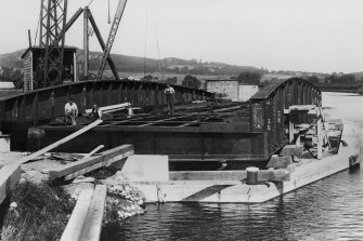 'Tomnahurich Bridge Inverness...'. View of tail end and deck under construction
d:'1/8/38'
Photographed by P Craigie Fleming, Friars' Street, Inverness
copy of B91719/PO