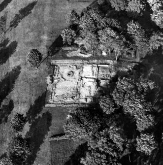 Oblique aerial view of the headquarters building of Bar Hill Roman Fort during excavation