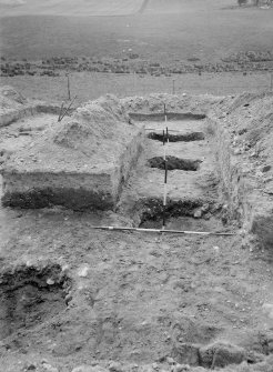 Excavation photograph - North gate, east side of east tower, looking north.
Glass plate negative.