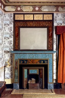 Interior view showing detail of fireplace and overmantel in Manager's House, Dunmore Pottery.
