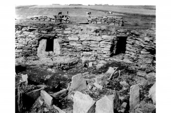 Excavation photograph.  Room in wall and entrance to second stairs.