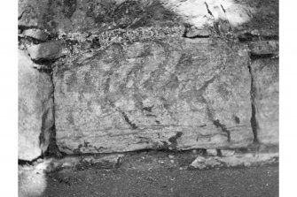Roman Stone found in the wall of Cramond Kirk (NT 18977683)