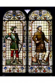 View of stained glass window representing archery and shooting in the Oyster Bar at Edinburgh's Cafe Royal.