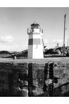 Crinan Canal, Crinan Basin, Lighthouse.
View of lighthouse and slots for storm gates in Eastern entrance of canal basin