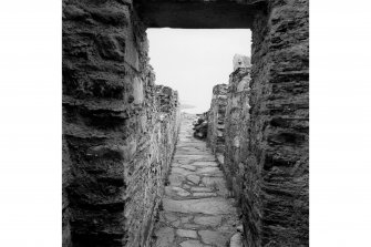 Castle Sween, interior.
General view of East wall-walk from North-East turret.