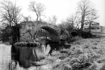 Bridge of Earn, Old Bridge.
General view from North of surviving arches on South bank.