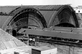 View of train sheds at St Enoch Railway Station, Glasgow, from South East.
The station closed in 1966 and the building was demolished in 1977. Now the site of the St Enoch Centre.