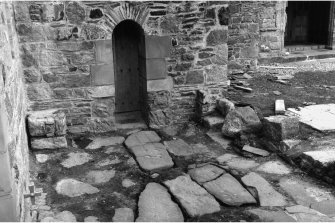Iona, Iona Abbey.
View of Early Christian slabs in pavement outside St Columba's Cell.