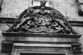 Detail of escutcheon on front entrance.