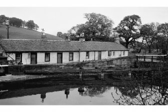 General view of Craigmarloch drawbridge and cottages on Forth and Clyde Canal