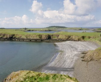 Canna, Canna Harbour. View across harbour, looking towards Sanday from Coroghon Castle