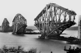 View of the Forth Bridge under construction.
Insc.'The Forth Bridge. Length including Viaduct 8098 Ft. Height 369 Ft. Spans 1710 ft each. 9/3/89.  656.'