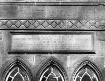 Detail of inscription on S face of steeple.
Insc. 
'DEO. O. M. ET SACRUM
LORD INNERPEFFER. ANDREW FLETCHER ESQ. THE PATRIOT  
LORD MILTON  
THIS SPIRE WAS ERECTED BY GEN. FLETCHER CAMPBELL AS A MONUMENT TO THE VIRTUE OF HIS ANCESTORS AND AN EXAMPLE FOR THEIR POSTERITY TO IMITATE. SALTON 1805.'