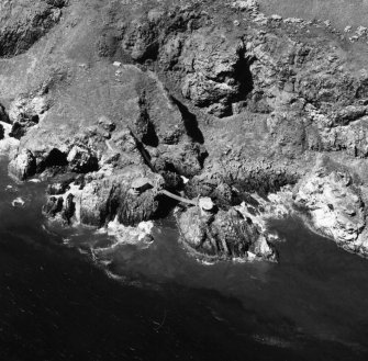 Scanned image of Aerial view of North Sutor coast battery, First World War installation and Second World War searchlight platforms from the S.