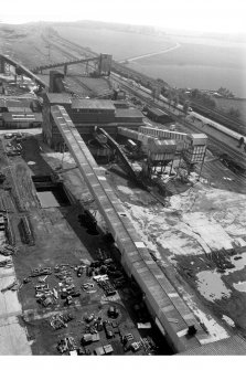 View from the top of No.1 winder's tower (from the North) of gantry containing two conveyors leading to coal preparation plant (made by Simonacco of Carlisle in 1960s), Seafield Colliery