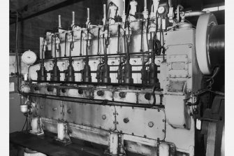 Fan house - detail of standby diesel alternator set.  Alternator made by Houchin Ltd (London), 500/550v, 290a, 600rpm (built 1955), Seafield Colliery