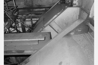 No.1 shaft - detail at top of shaft showing two chutes down which coal is emptied from full skips raised up the shaft (payload 15 tons per skip), Seafield Colliery